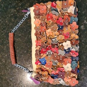 Floral 3d leather studs purse with chain strap and longer leather strap.